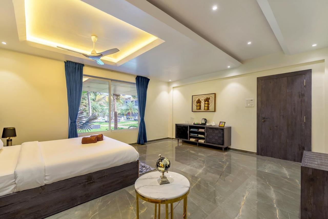 Saffronstays Palm Paradise, Kalyan Khadavli - Swimming Pool With Water Slides, Gazebo And Indoor Games Padghe Esterno foto